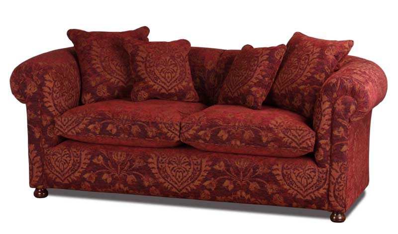 Foto von einem Chesterfield Sofa in Stoffbezug bordeaux